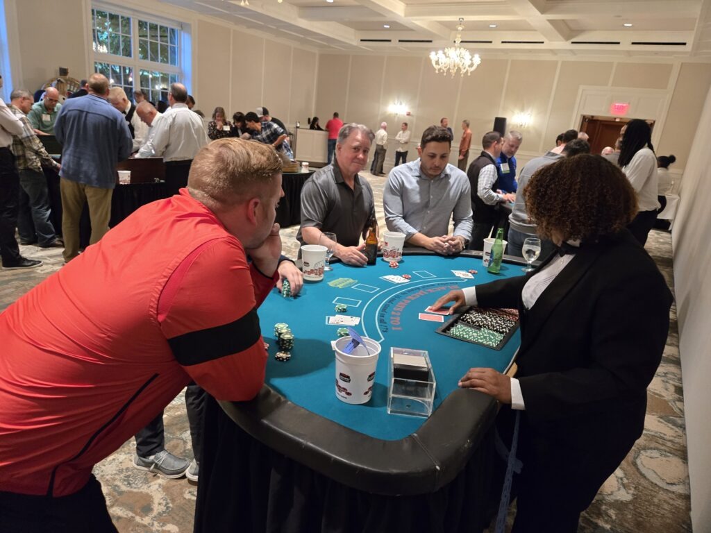 Casino table with players and dealer.